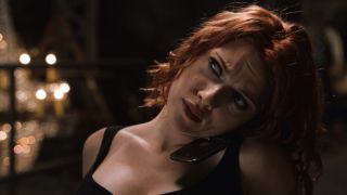 Black Widow on the phone while tied to a chair in The Avengers