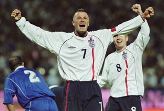 David Beckham celebrates after scoring a free-kick for England against Greece in Athens in 2001.