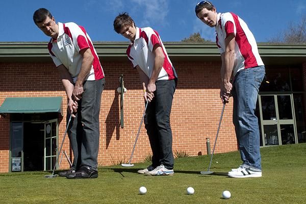 Lawson Homes teammates (L-R): Tim Elmer, Joel Stearnes and Michael Smith try their hand at some golf prior to the start of the 2010 Tour of Tasmania in Launceston.