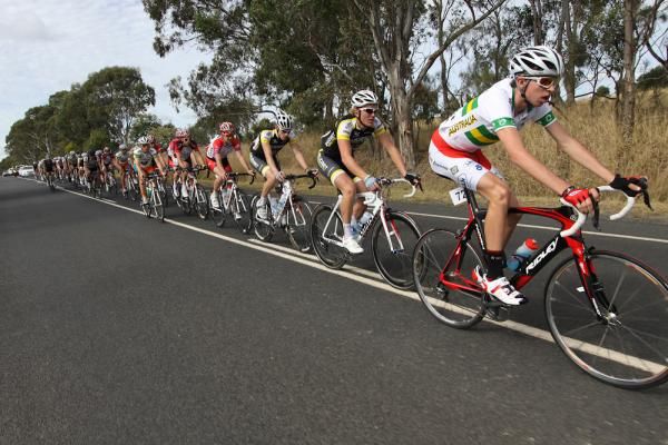 Damien Howsen leads the peloton through the beautiful Outback country of Australia.