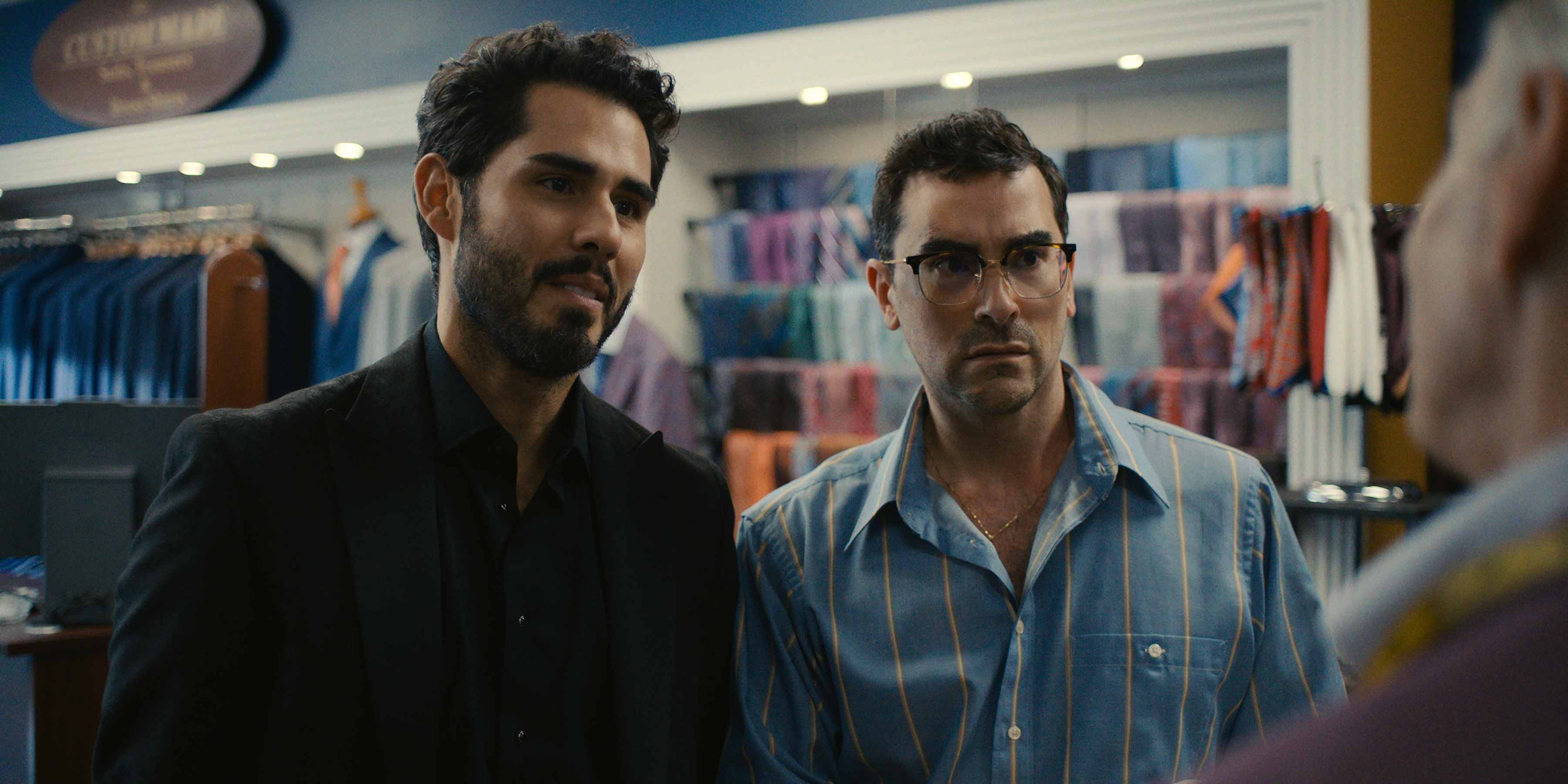 Jacob Gutierrez as Tareq and Dan Levy as Nicky stand in a hardware store in Episode 103 of Big Mistakes.