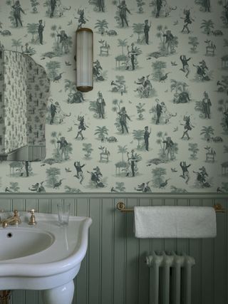 grey powder room with wall paneling tongue and groove and patterned wallpaper by Divine Savages