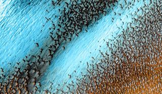 Blue dunes on the surface of Mars.