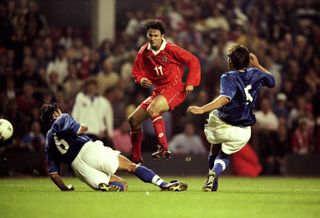 Ryan Giggs in action for Wales against Italy in 1998.