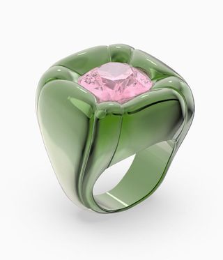 Swarovski green ring with a pink crystal in.