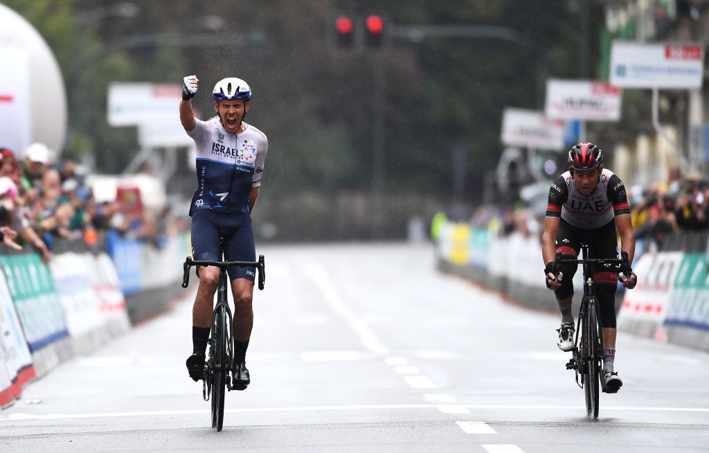 VARESE ITALY OCTOBER 05 Alessandro De Marchi of Italy and Team Israel StartUp Nation celebrates winning ahead of Davide Formolo of Italy and UAE Team Emirates during the 100th Tre Valli Varesine a 1967km race from Busto Arsizio to Varese 377m AlfredoBindaVa on October 05 2021 in Varese Italy Photo by Tim de WaeleGetty Images