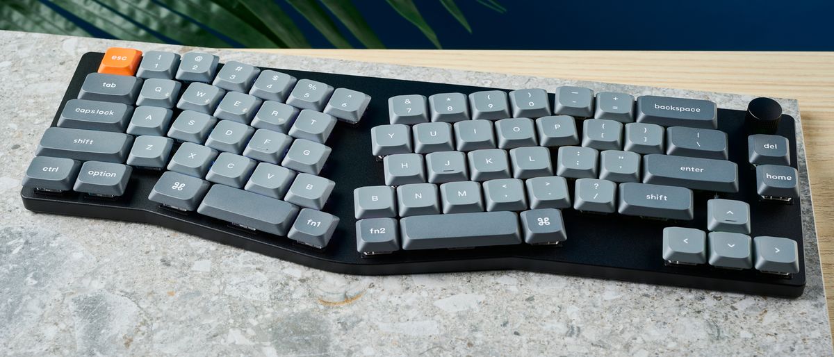 A Keychron K11 Max wireless ergonomic keyboard with a 65% Alice layout