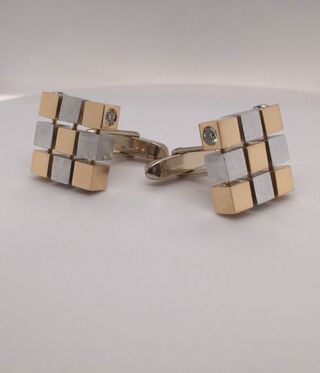 Aluminium and gold cufflinks with diamonds, by Indian jewellery brand Moksh