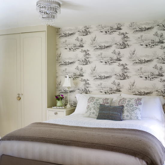 bedroom with master bed and lamp