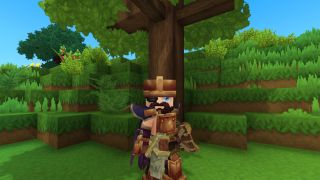 Hytale softwood planks: A third-person image of a character stood in front of a tree holding an axe.