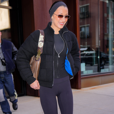 bella hadid wearing all-black outfit and black boots