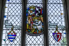 St Crispin and St Crispian celebrated in stained glass at St Peter's church, Harrold, Bedfordshire.