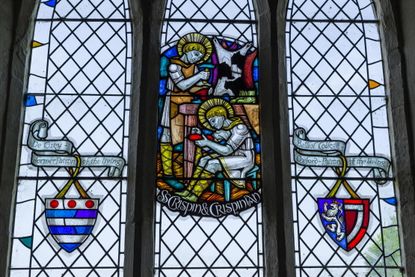 St Crispin and St Crispian celebrated in stained glass at St Peter's church, Harrold, Bedfordshire.