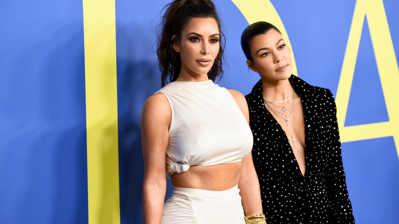 Kim Kardashian West and Kourtney Kardashian attend the 2018 CFDA Fashion Awards at Brooklyn Museum on June 4, 2018 in New York City.