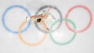 MILAN, ITALY - FEBRUARY 17: (EDITORS NOTE: Image was captured using a robotic camera positioned above the field of play.) Alysa Liu of Team United States competes during the Women's Single Skating - Short Program on day eleven of the Milano Cortina 2026 Winter Olympic games at Milano Ice Skating Arena on February 17, 2026 in Milan, Italy. (Photo by Jared C. Tilton/Getty Images)