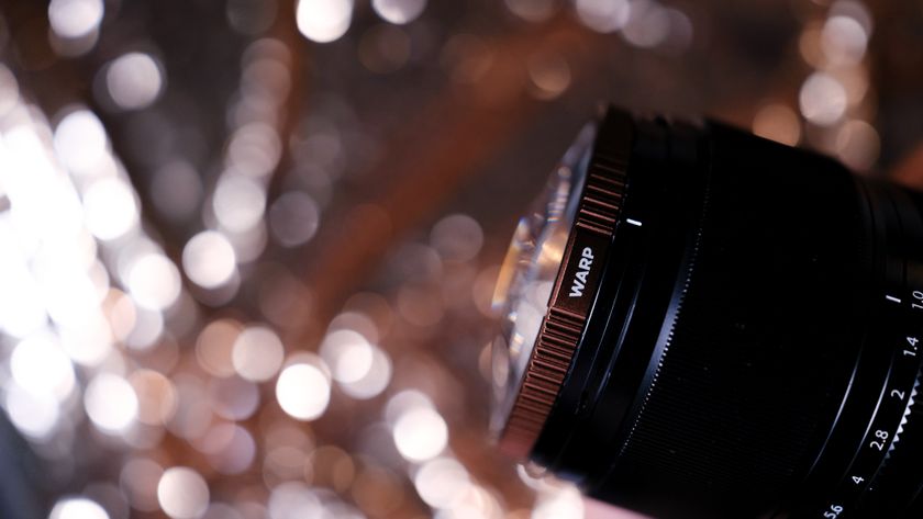 The PolarPro Warp filter on a gold bokeh background