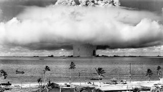 The underwater Baker nuclear explosion on July 25, 1946, created a huge mushroom-shaped cloud that spread radiation far and wide. Image taken from a tower on Bikini Island.