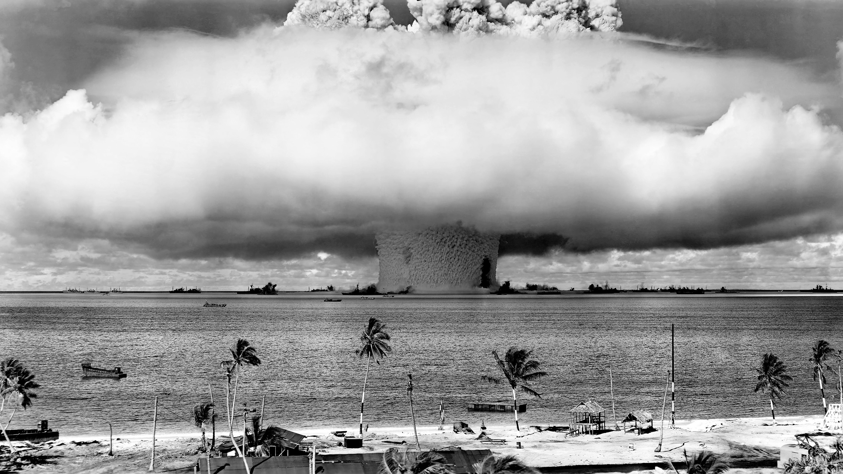 The underwater Baker nuclear explosion on July 25, 1946, created a huge mushroom-shaped cloud that spread radiation far and wide. Image taken from a tower on Bikini Island.