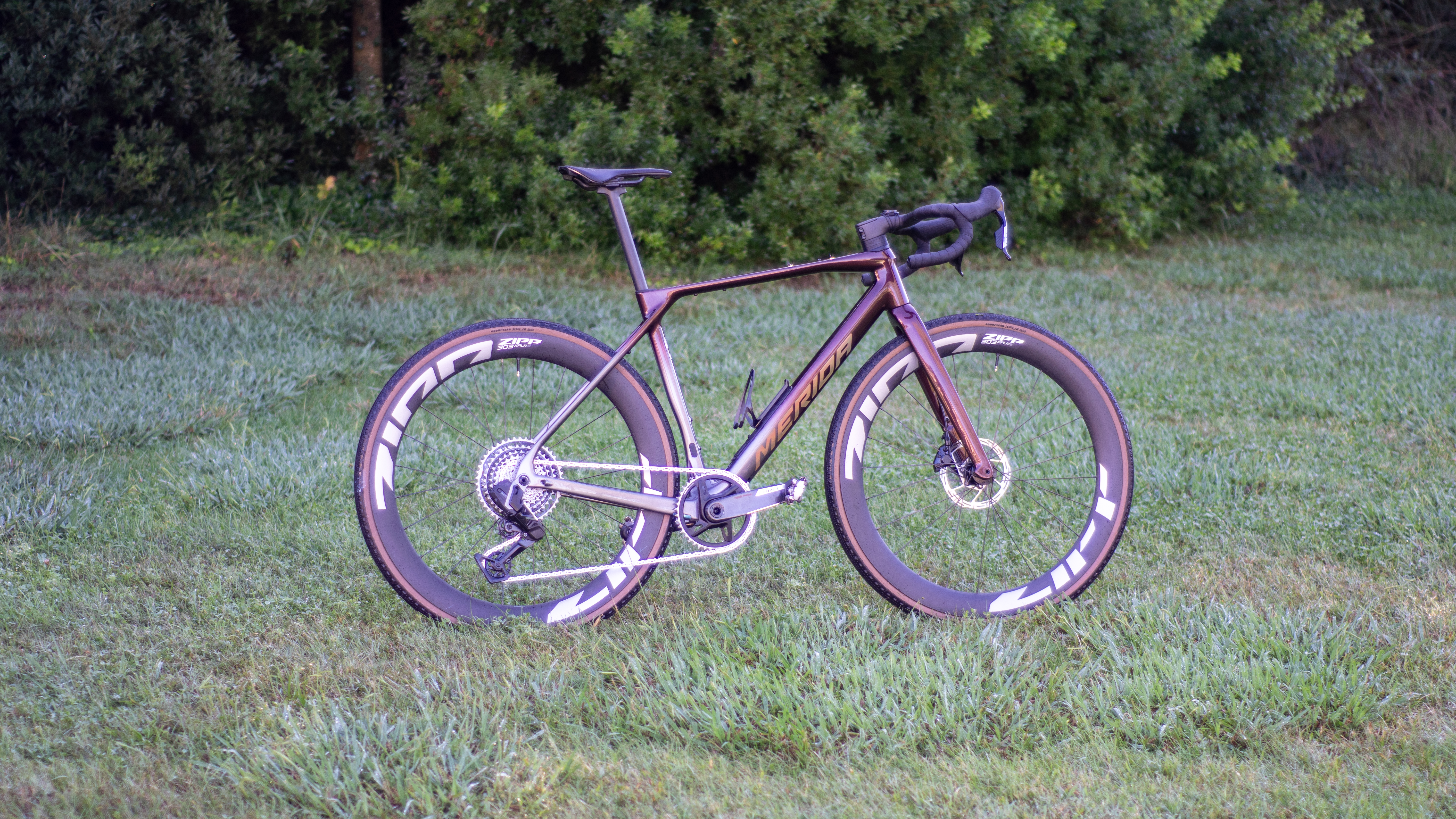 A Merida Mission gravel bike on some grass