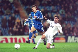 Andriy Shevchenko of Dynamo Kyiv and Fernando Hierro of Real Madrid compete for the ball during the UEFA Champions League Round of 16 first leg match between Real Madrid and Dynamo Kyiv at the Estadio Santiago Bernabeu on March 3, 1999 in Madrid, Spain.