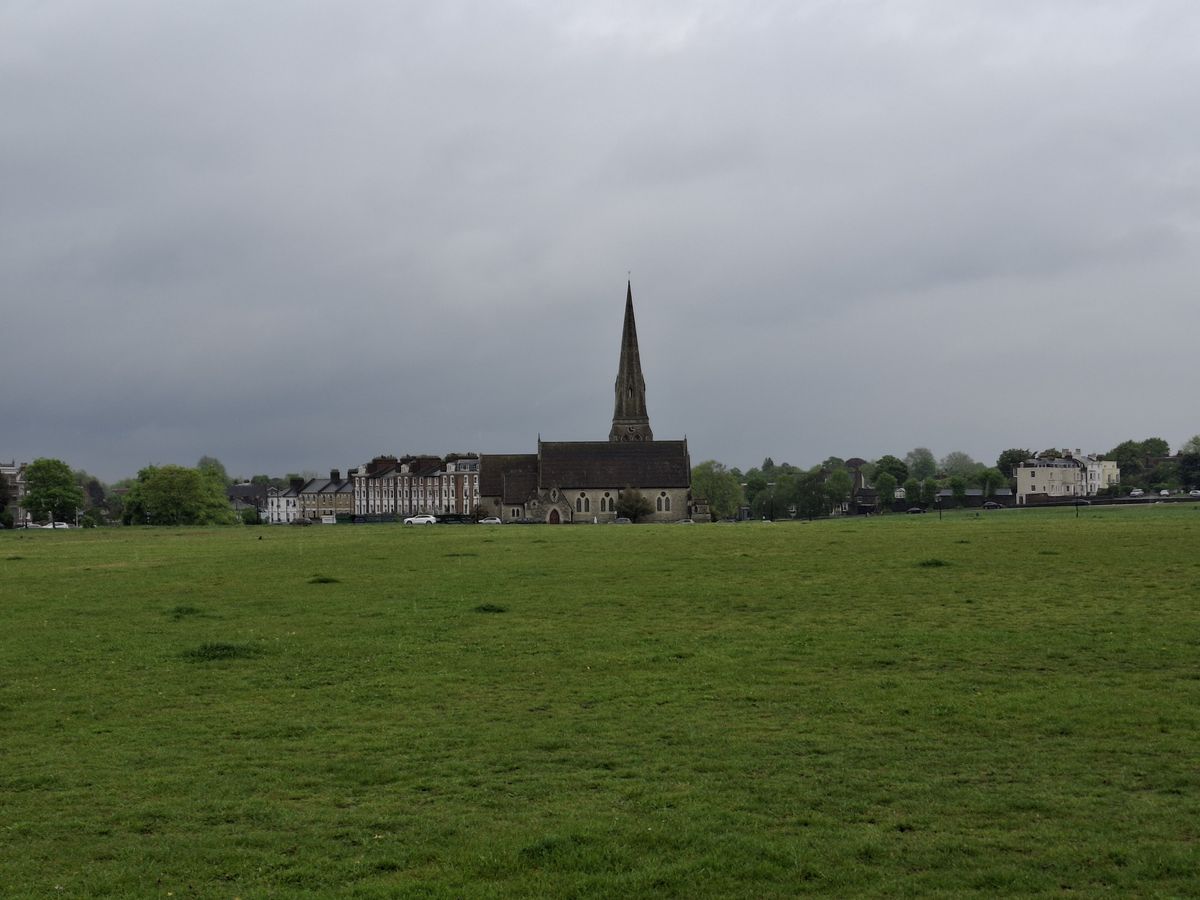 A field with a church taken on the Samsung Galaxy A35