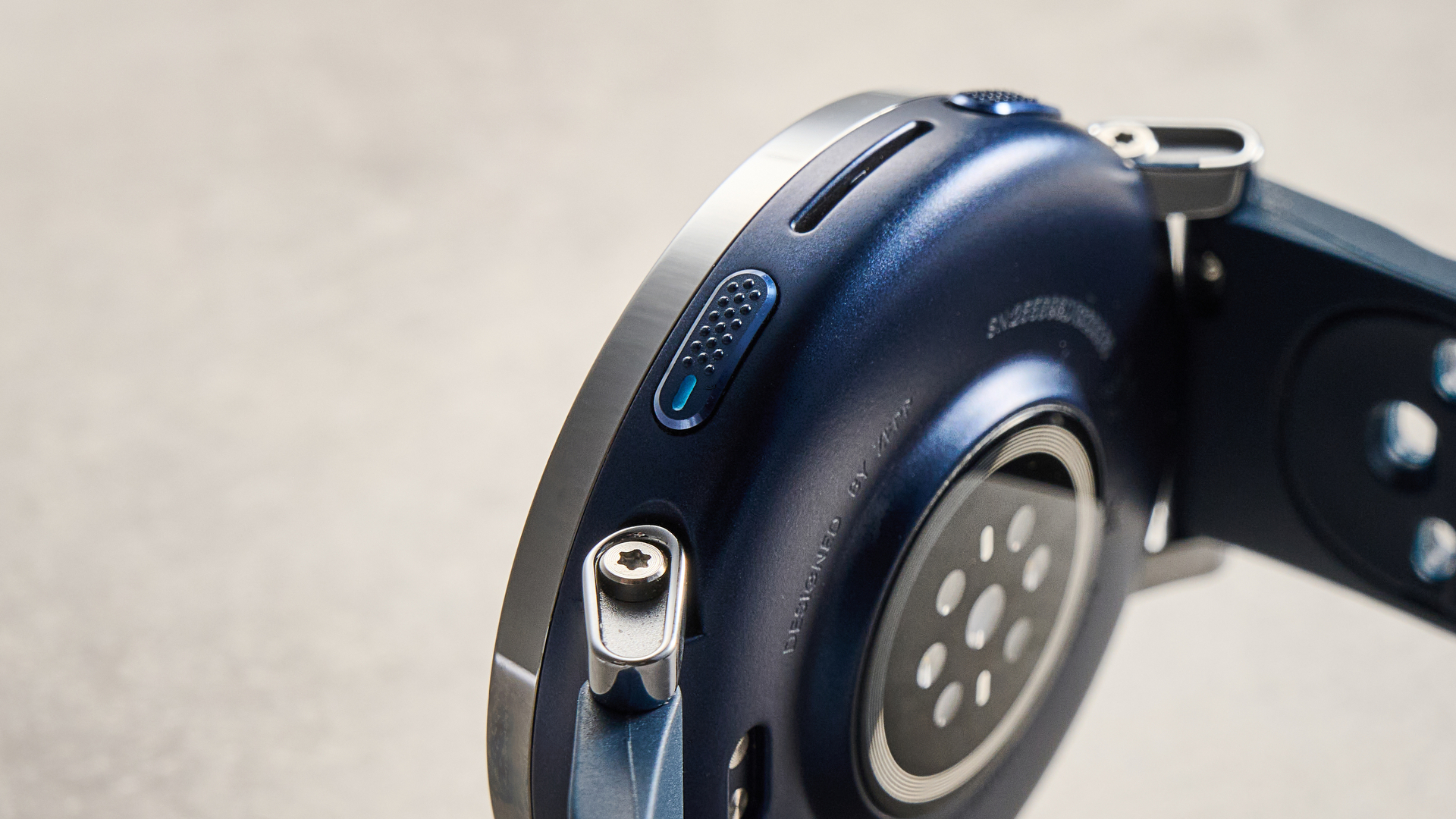 the amazfit active 3 premium photographed against the blue tom's guide background