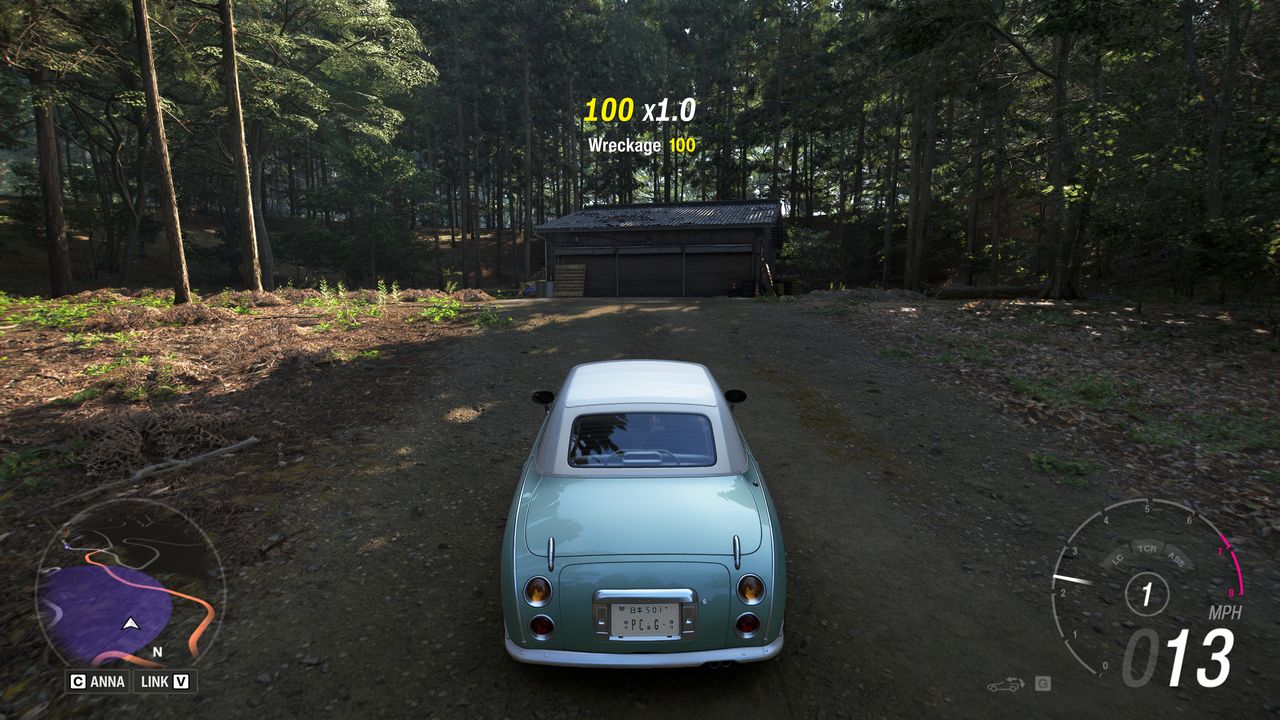 Forza Horizon 6 Barn Finds: A player parked outside an old wooden barn on a wooded hillside.