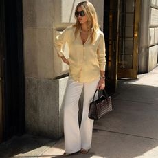Cass Dimicco in a yellow Massimo Dutti top and Aureum bag