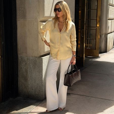 Cass Dimicco in a yellow Massimo Dutti top and Aureum bag