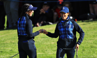 Celine Boutier and Georgia Hall fist bump during the Solheim Cup