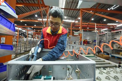 China factory worker is back on the job