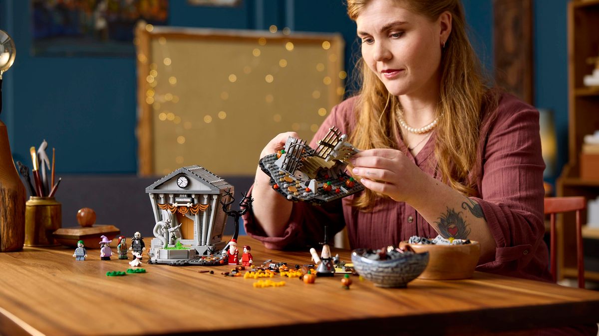 The Lego Nightmare Before Christmas kit in parts, on a wooden table
