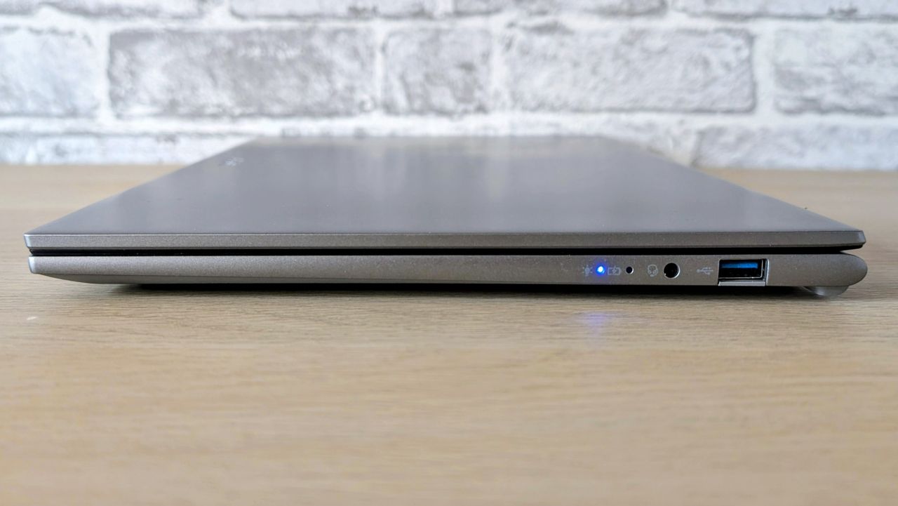 The Acer Aspire Go on the ITPro background