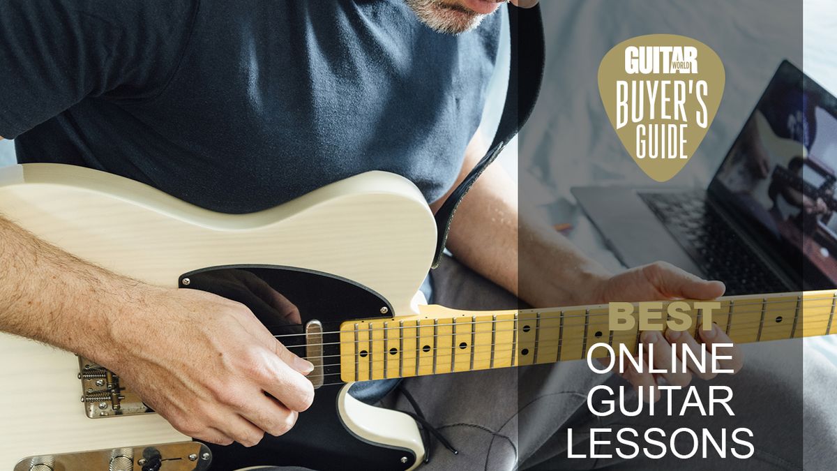 Man playing with white Telecaster watching a guitar video on his laptop