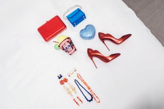 Tiffany Boone's accessories for the Lion King: Mufasa premiere laid out on her bed