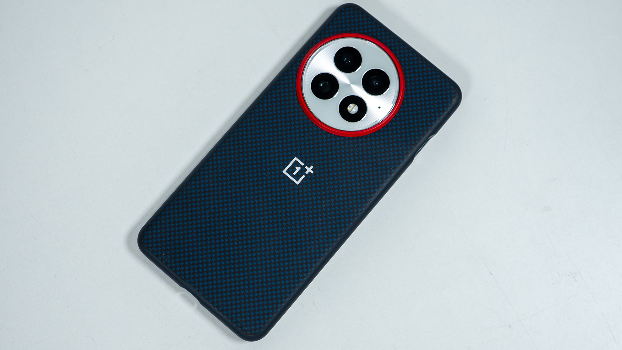 The back of the official blue OnePlus 13 soft case