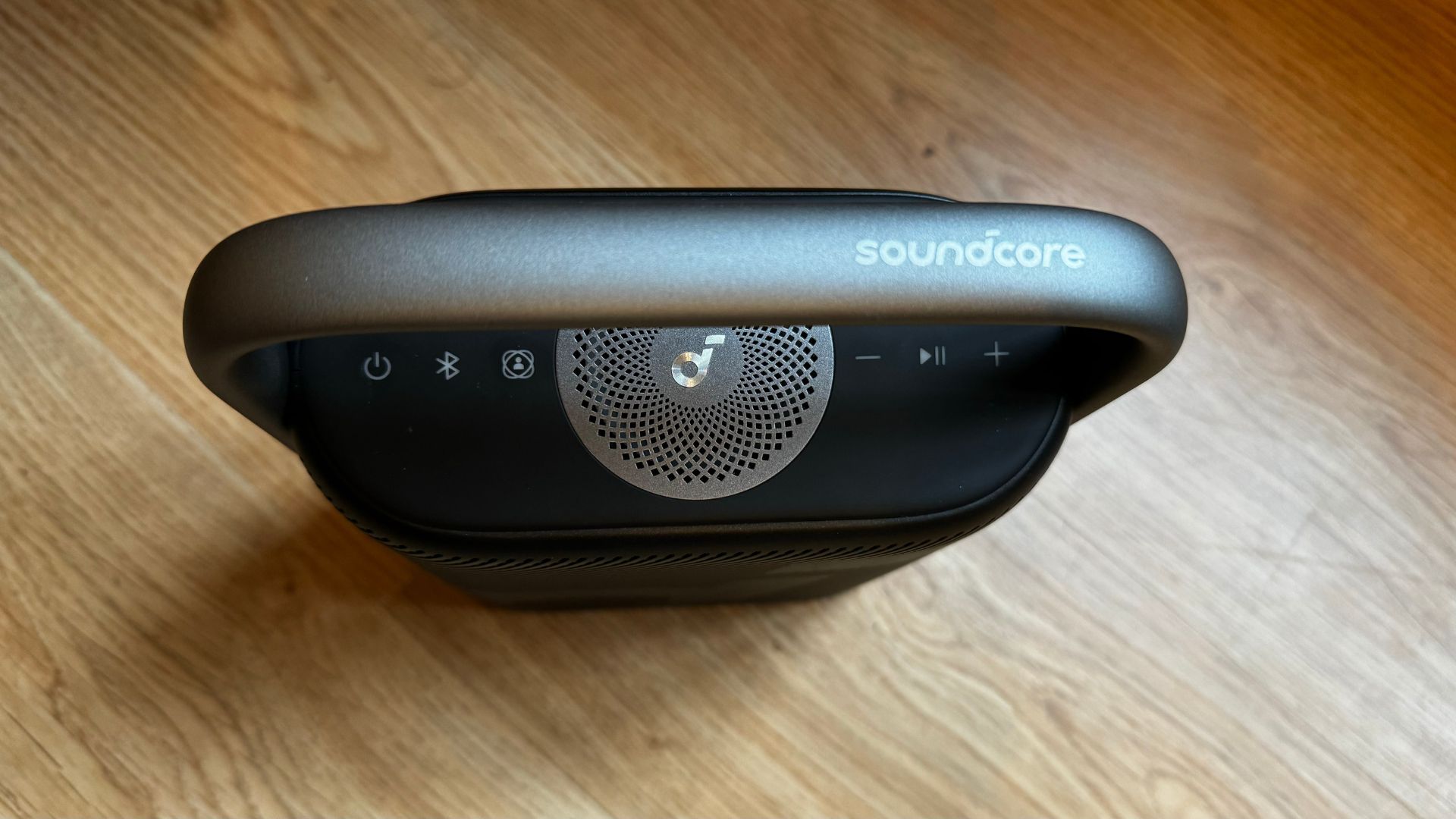 Soundcore Motion X500 from the top, showing the grill of the upfiring speaker