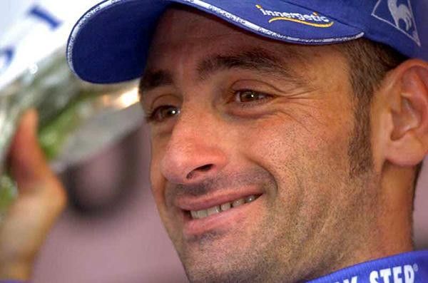 Paolo Bettini (Quickstep) grins on the podium