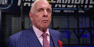 Ric Flair looking ashamed WWE