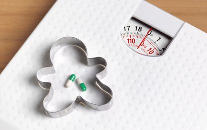 Weight loss or diet pills on bathroom scales