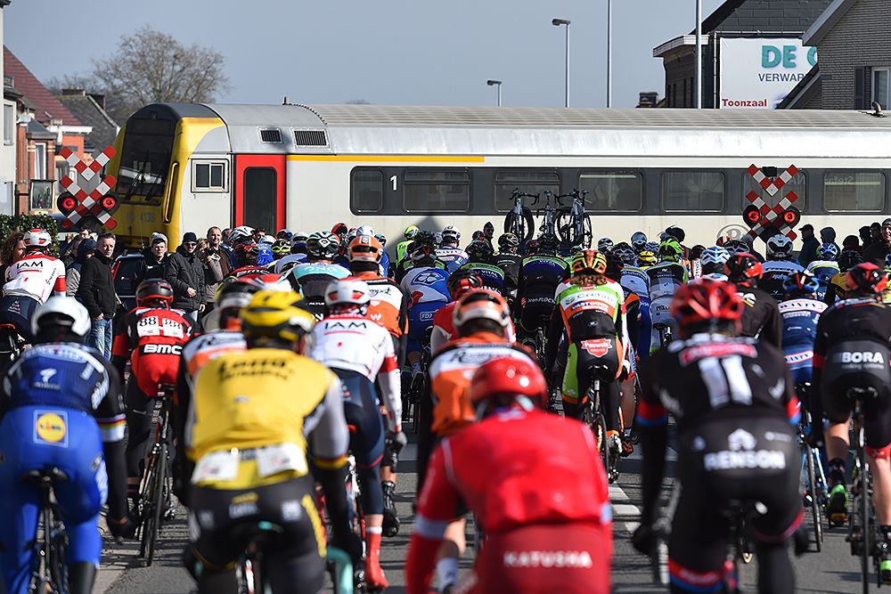 Riders head to the start of Kuurne-Brussel-Kuurne