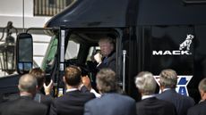 U.S. President Donald Trump sits in the cab of a tractor trailer during an event with truckers and truck industry chief executive officers on the South Lawn of the White House in Washington, D.C., U.S., on Thursday, March 23, 2017. House leaders delayed a scheduled vote on their embattled health-care bill as conservatives mulled a deal proposed by the Trump administration aimed at winning Republican holdouts support. Photographer: Andrew Harrer/Bloomberg via Getty Images