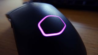 Cooler Master MM731 gaming mouse pictured with RGB enabled