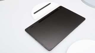 Samsung Galaxy Tab S8 Ultra on a white surface with a stylus