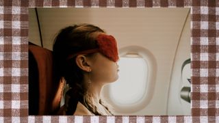 A girl with a orange fluffy eye mask on sleeping on plane on a gingham background