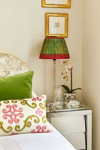 Green and oink lampshade, cushions and orchid