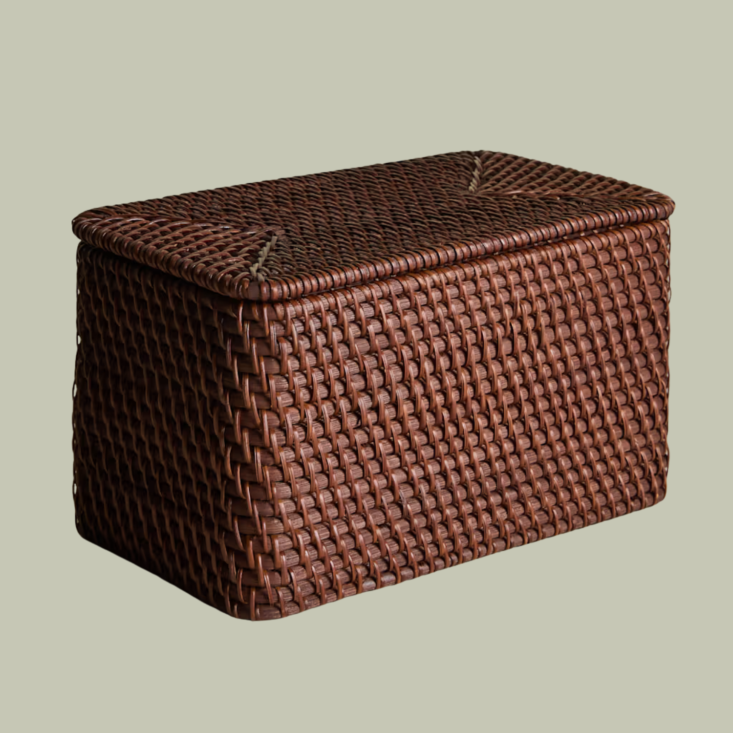 A brown rattan storage box