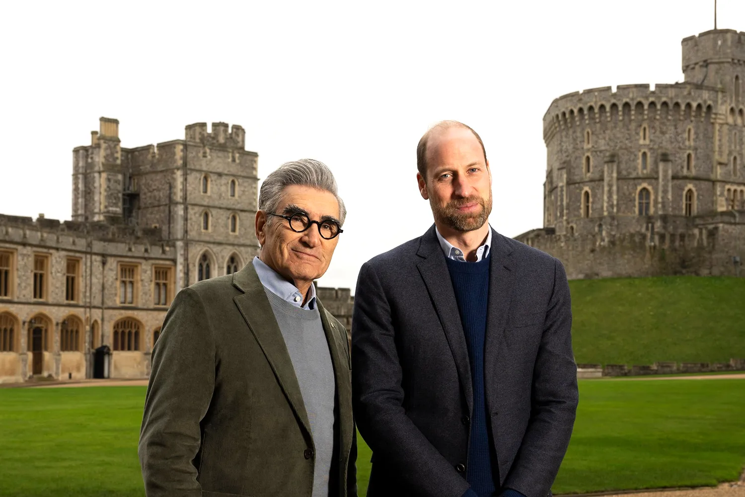 Prince William posing in front of Windsor Castle with Eugene Levy