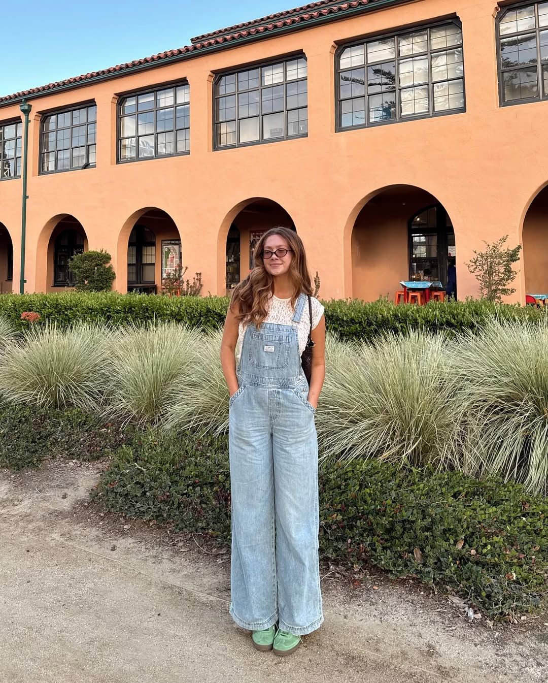 Allison in light-wash dungarees