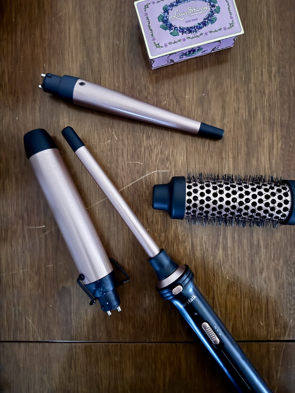 An array of attachments for the WavyTalk curling wand.